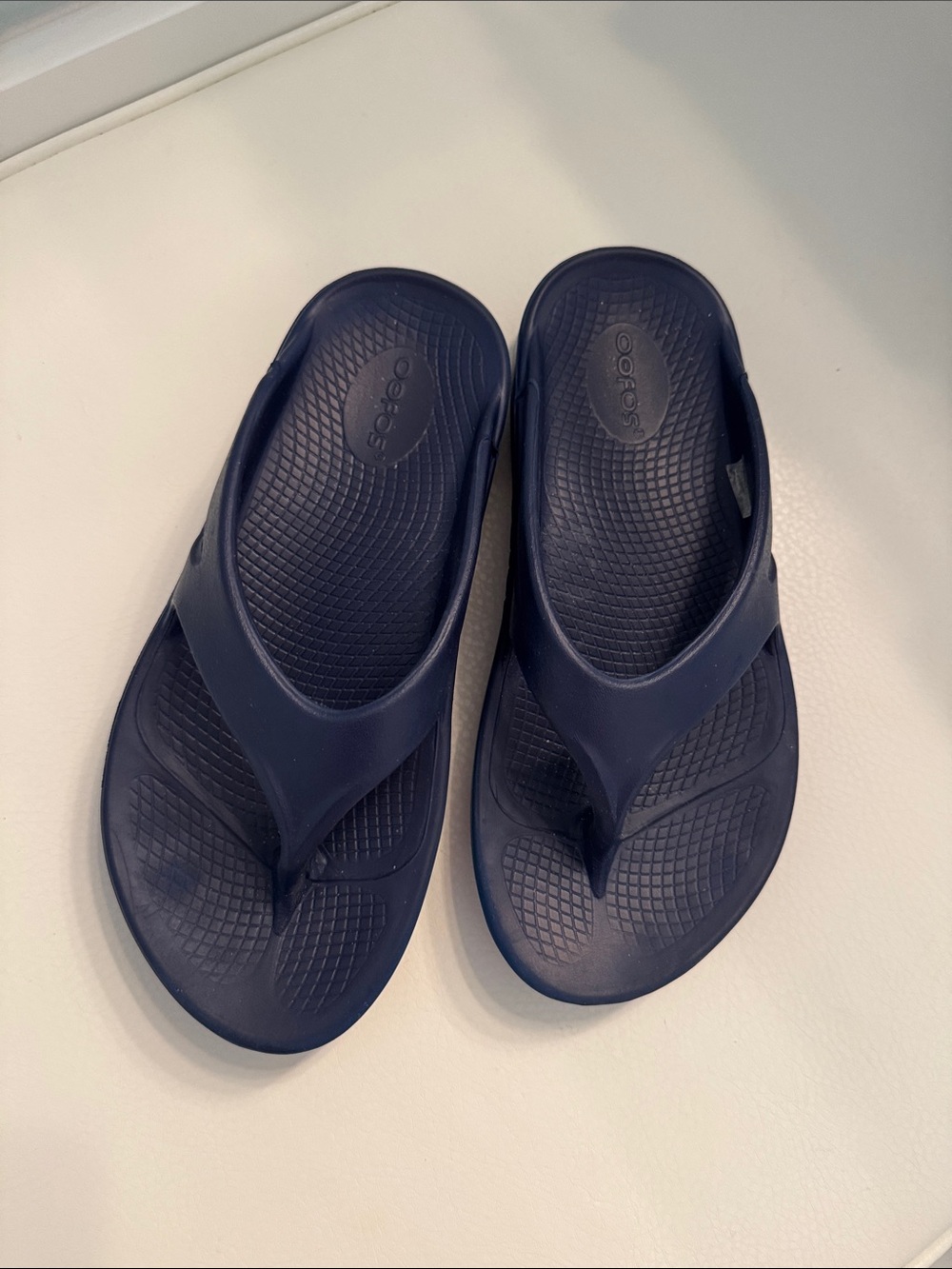 Oofos flip flops